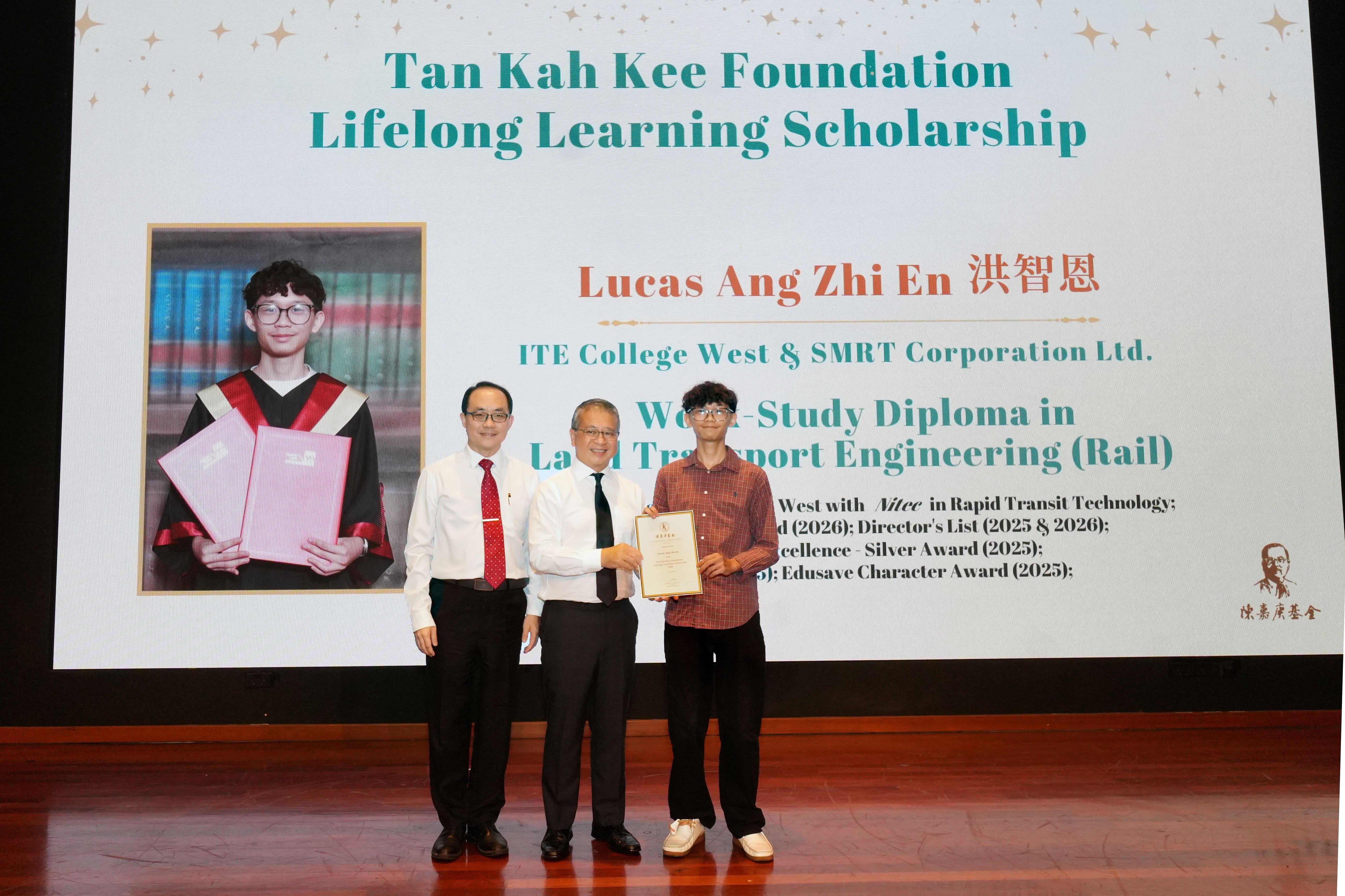 Recipient receiving scholarship on stage